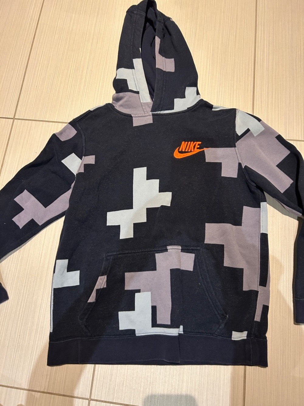 Nike Men's Black Crewneck Hoodie with Gray Geo Blocks and Orange Logo